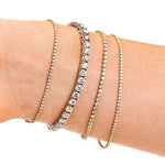 Bracelets Large 14K Gold and Diamond Tennis Bracelet 4-Prong Setting