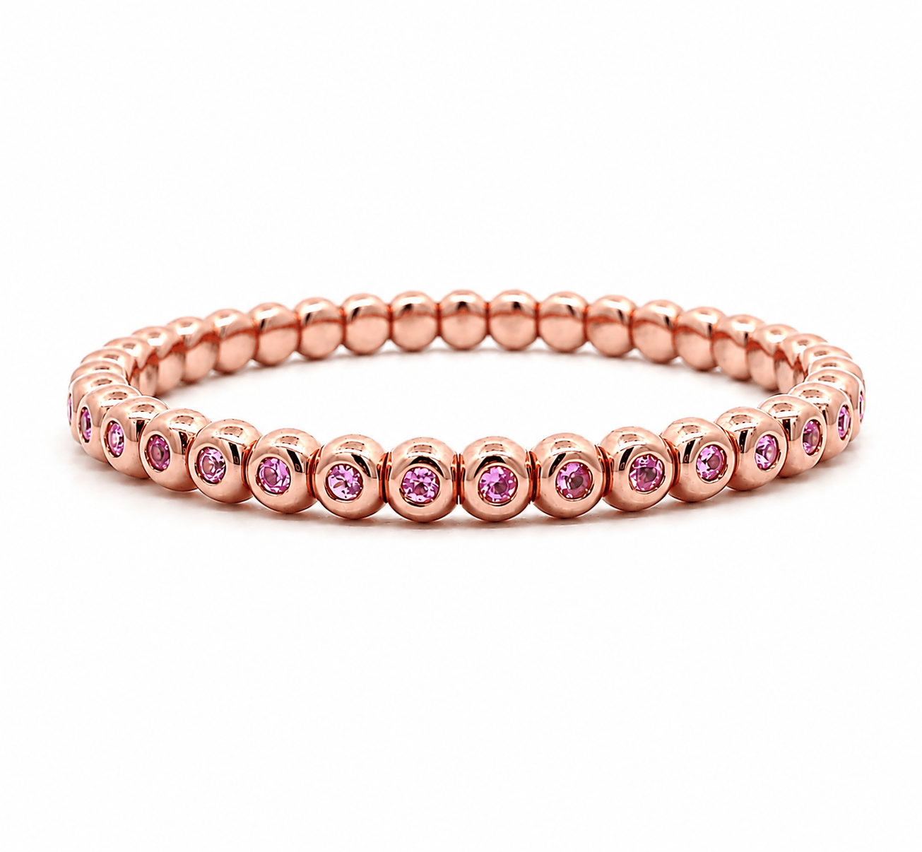 Bracelets XS:  45mm / Rose Gold 18K Gold And Pink Sapphire Bezel Set Stretch Tennis Bracelet