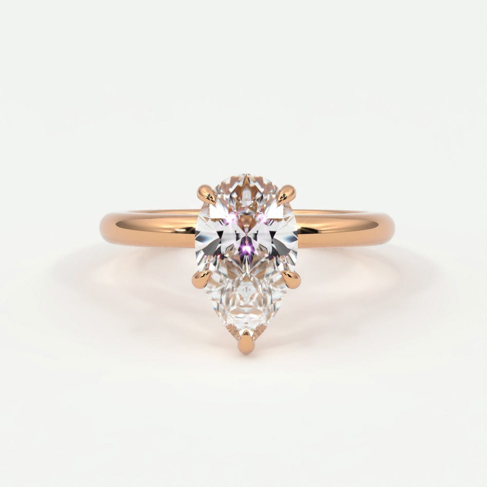 Rings 14K Rose Gold / 7 Pear Shape Diamond Solitaire Band