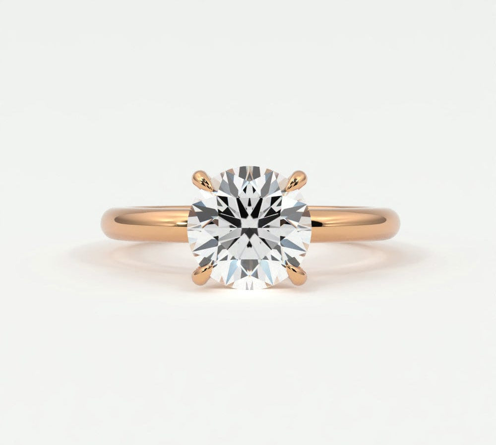 Rings 14K Rose Gold / 7 Round Brilliant Diamond Solitaire Band