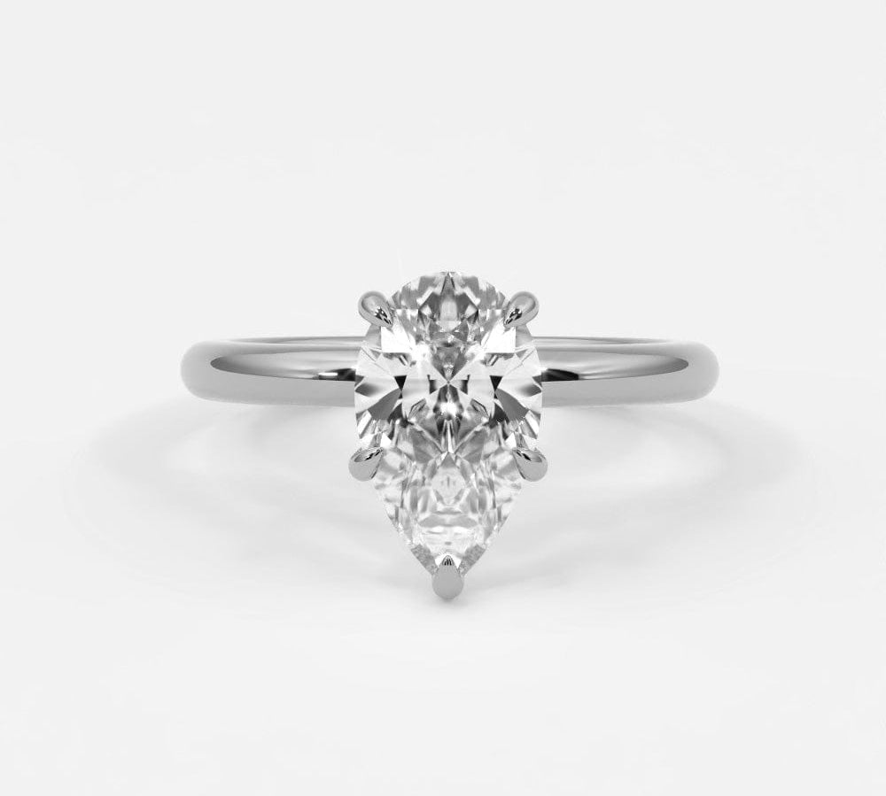 Rings 14K White Gold / 7 Pear Shape Diamond Solitaire Band