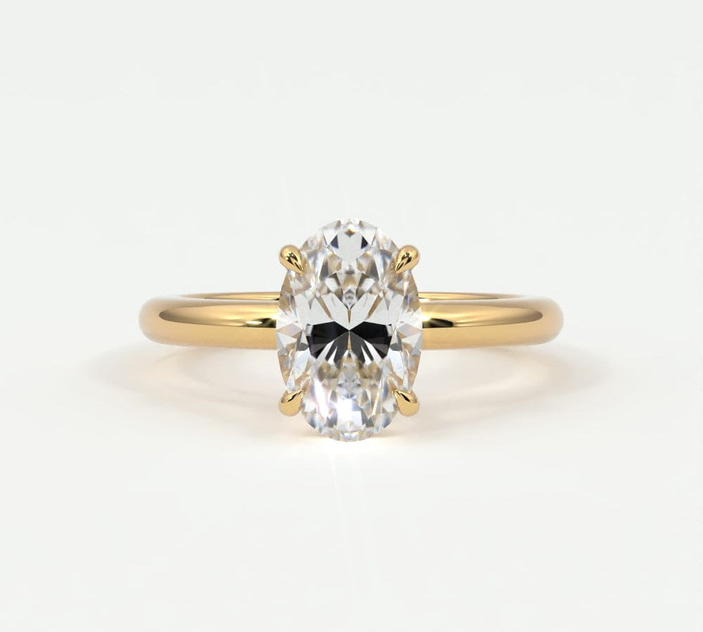Rings 14K Yellow Gold / 7 Oval Cut Diamond Solitaire Band